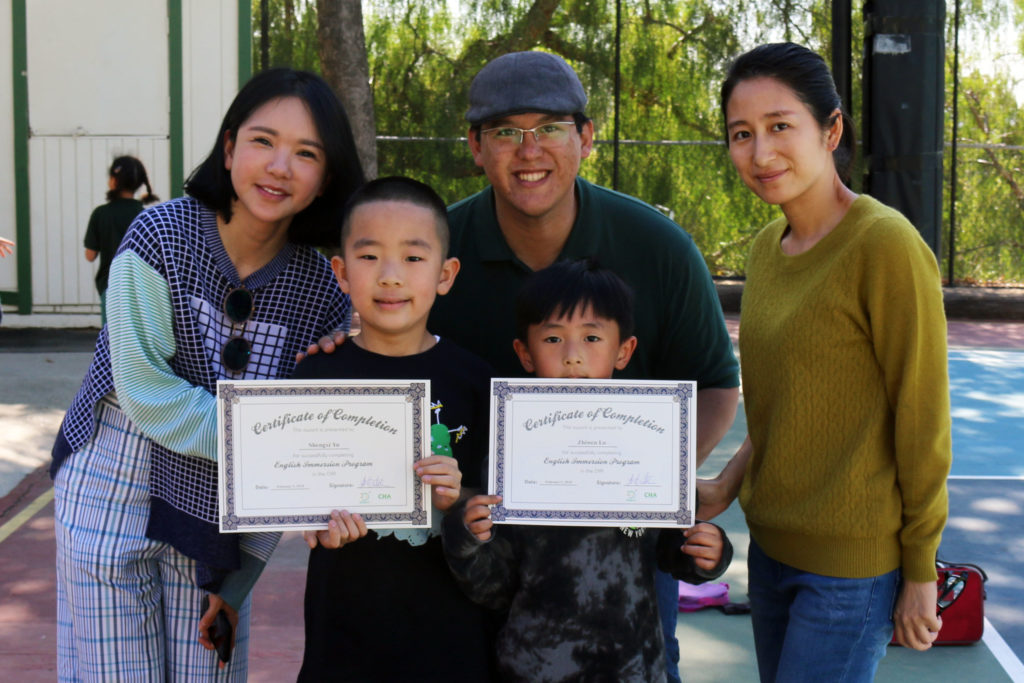 Campers receiving certificates of completion