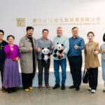 Stuart & Jeff pose with Chinese government officials in Shanghai/