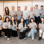 Stuart & Jeff pose with camp staff during a trip to China.