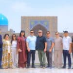Stuart, Jeff, and diplomats posing in Uzbekistan