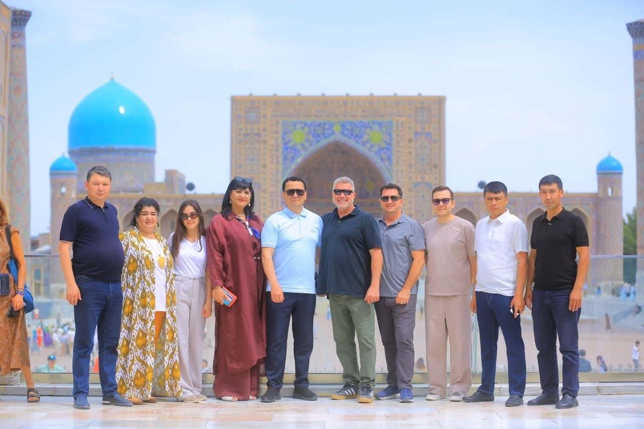 Stuart, Jeff, and diplomats posing in Uzbekistan