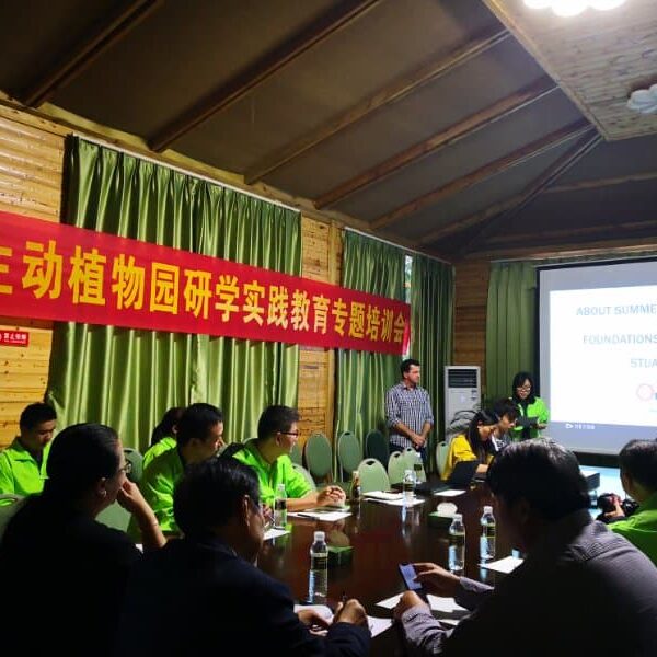 A group of people holding a training session led by Stuart Jones.