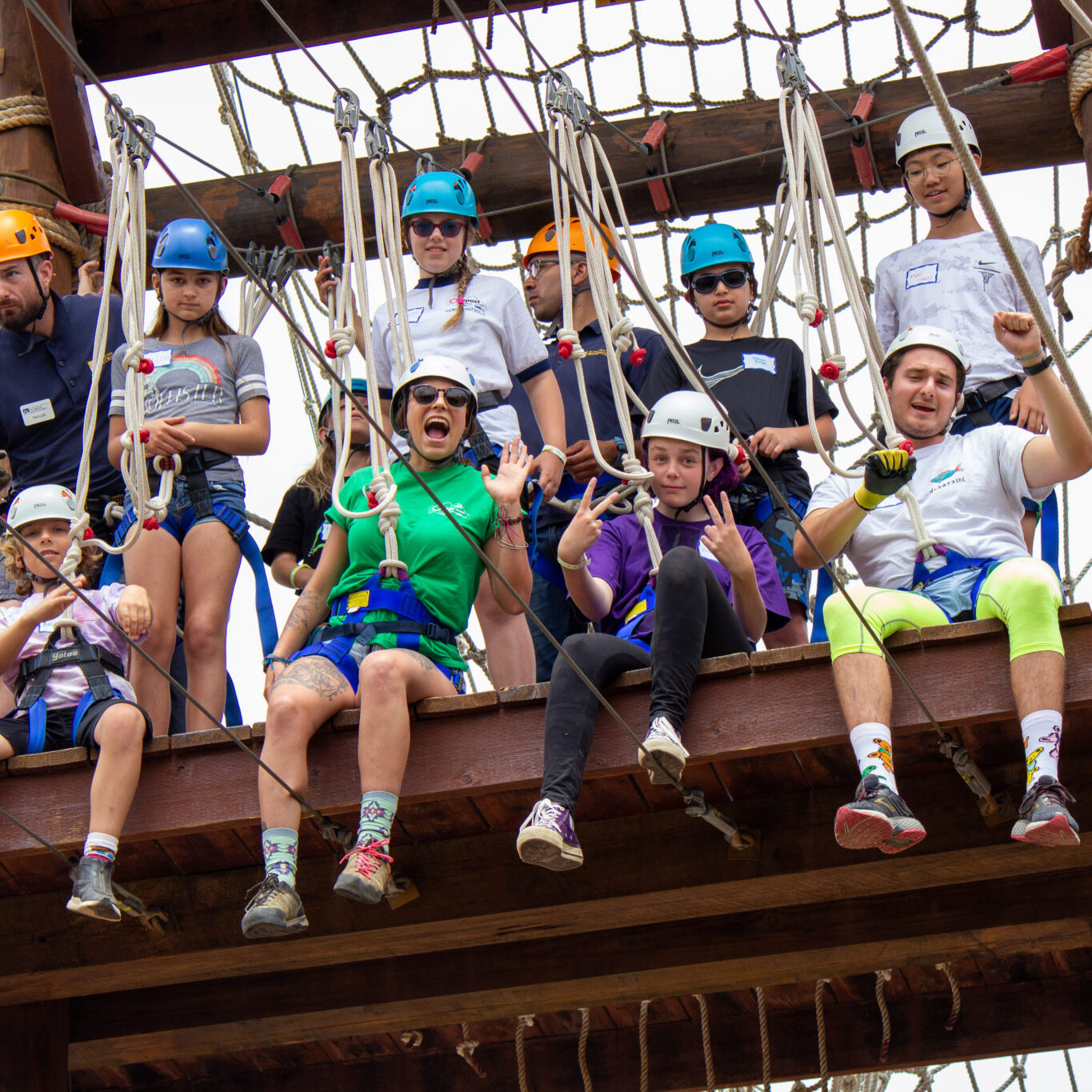 Campers and instructors getting read for the ropes course